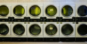 A laundry room with washing machines